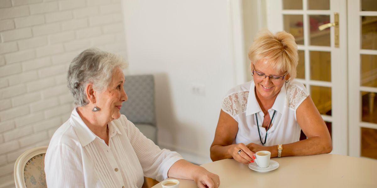 Two women discussing medicare coverage