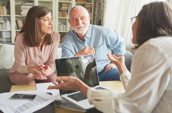 Elderly couple meeting with medicare broker