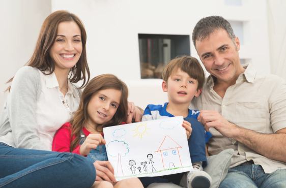 family sitting together in living area confident they have life insurance protection